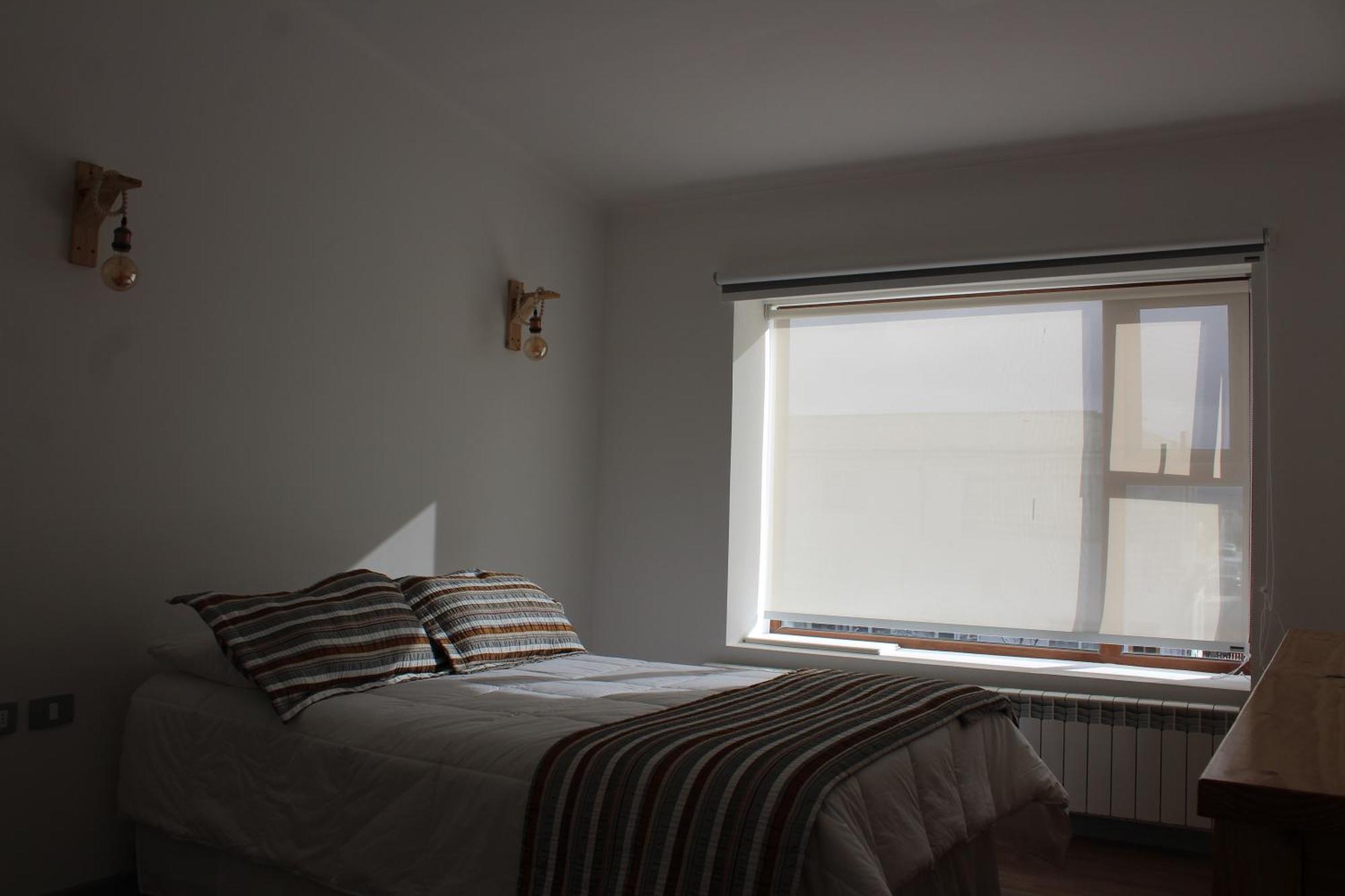פורטו נטאלס Hostal Alamo Patagonico מראה חיצוני תמונה