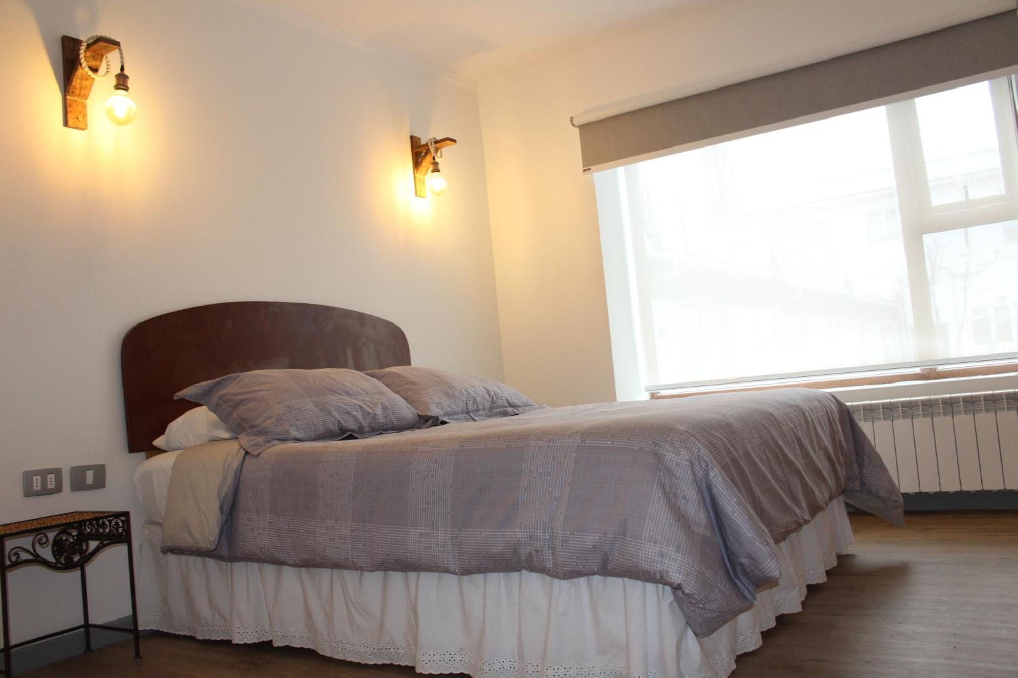 פורטו נטאלס Hostal Alamo Patagonico מראה חיצוני תמונה