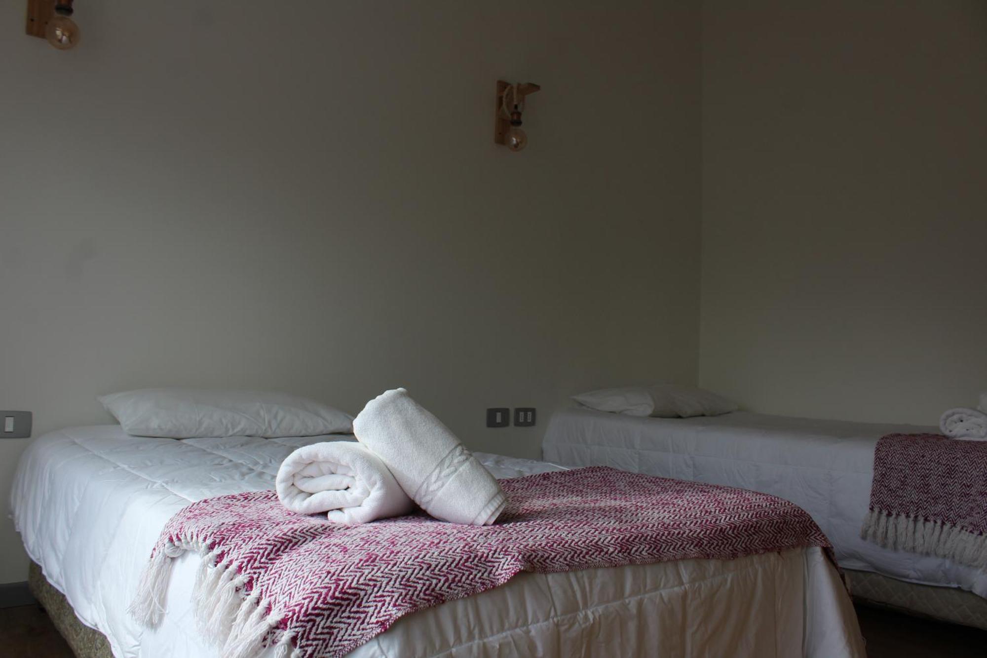 פורטו נטאלס Hostal Alamo Patagonico מראה חיצוני תמונה
