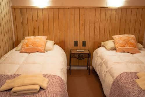 פורטו נטאלס Hostal Alamo Patagonico מראה חיצוני תמונה